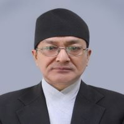 Honorable Til Prasad Shrestha